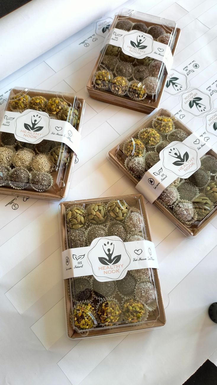 Cardboard boxes with transparent lids showcasing products, combining warm aesthetics with modern transparency.
